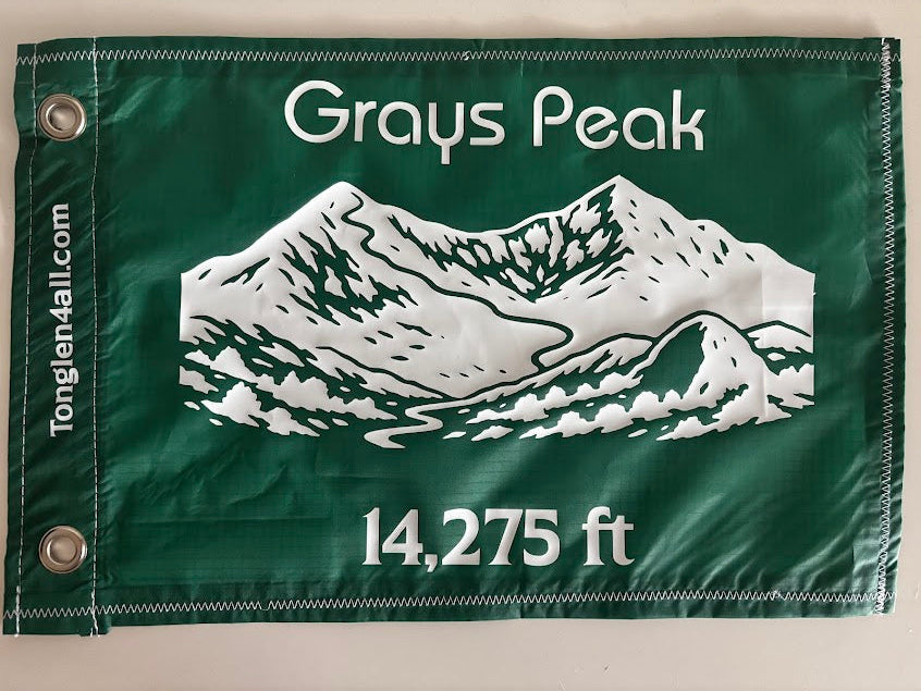 Green flag with mountain illustration and text on a white background