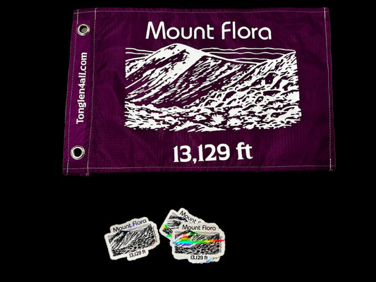 Purple flag with white text and graphics on a gray surface